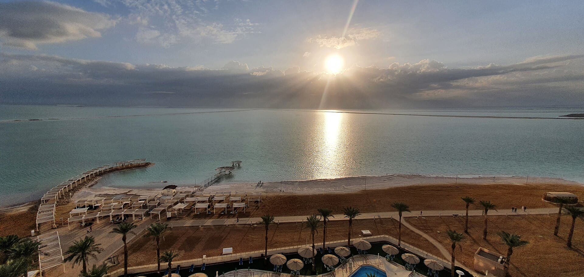 Sunrise over a calm coastline